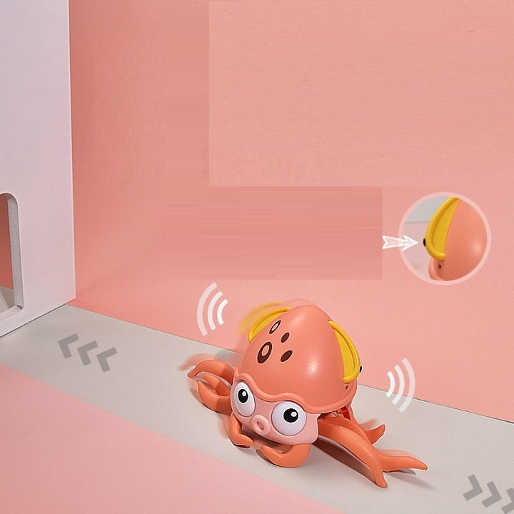 Dollcini Zenélő Mászó Polip Játék – LED Fényekkel, USB-s